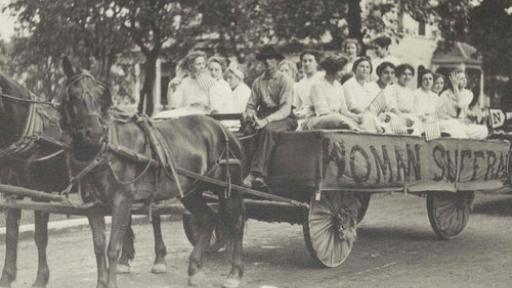 Photo of suffragettes in a horse drawn cart